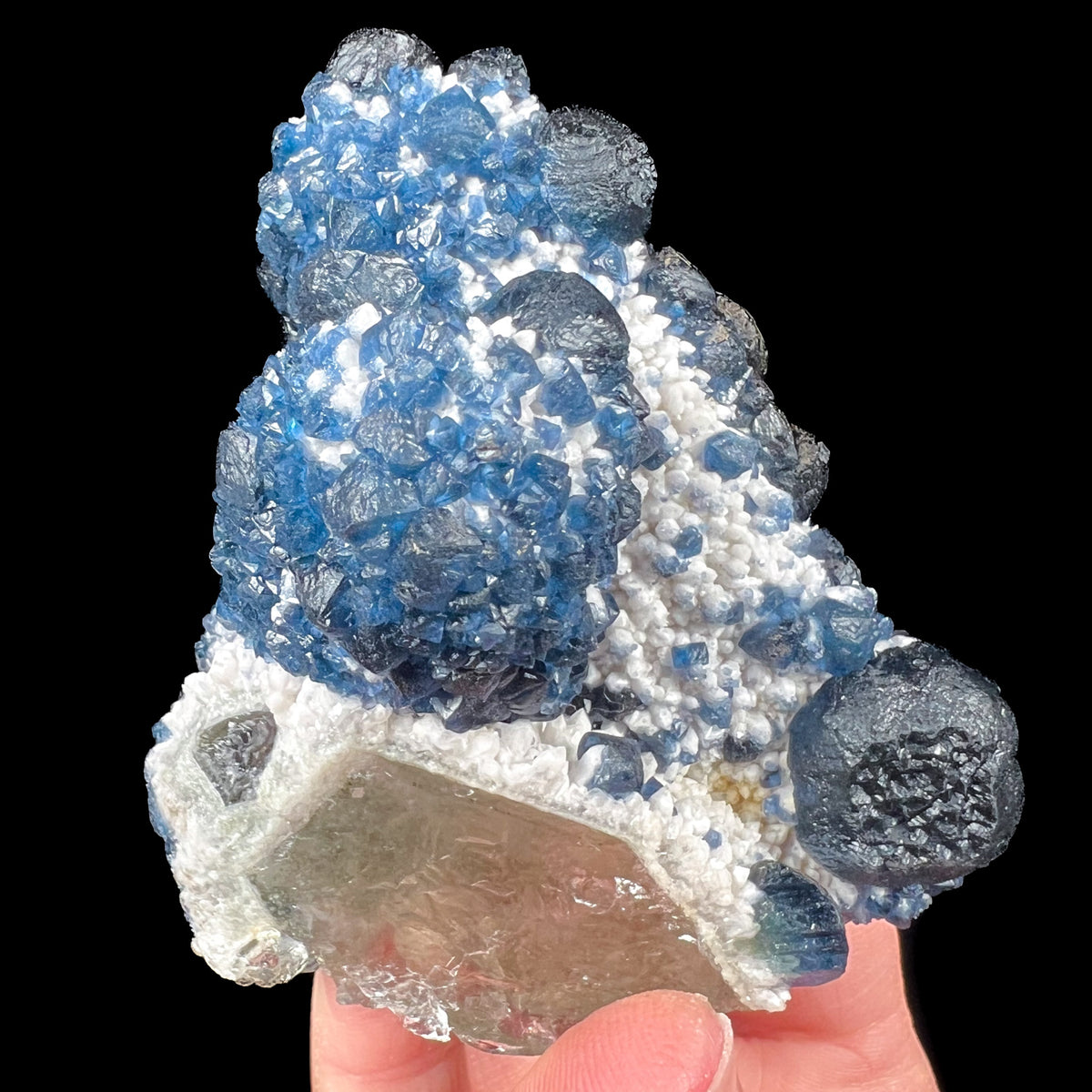 Blue Fluorite Mineral Specimen on White Quartz