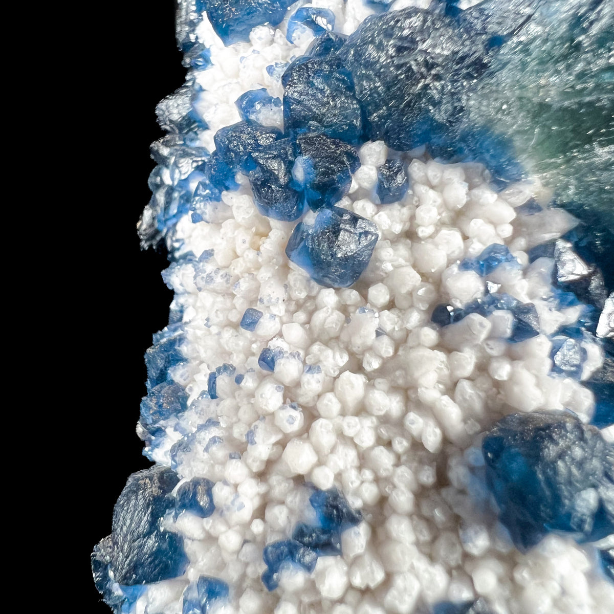 Close Up of Blue Fluorite on White Quartz